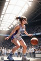 A woman in a basketball uniform dribbling a basketball on a court.