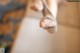 A close up of a person's feet on a yoga mat.